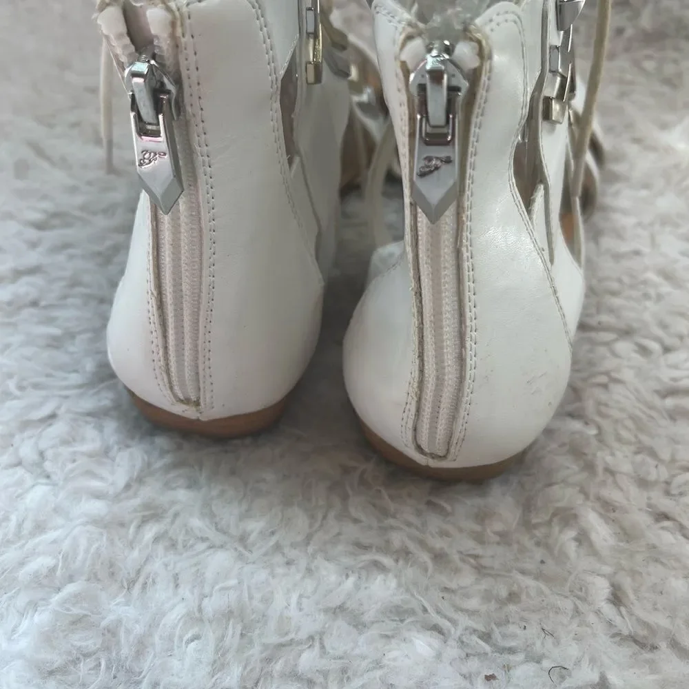 Fergie gladiator synthetic white lace up sandals with silver tone accents SZ 10